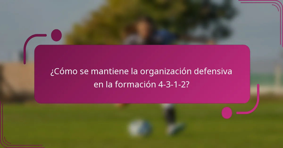 ¿Cómo se mantiene la organización defensiva en la formación 4-3-1-2?
